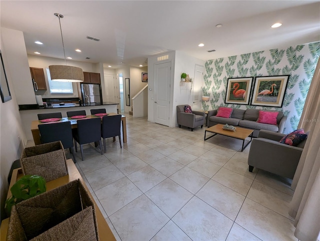 living room with light tile patterned floors