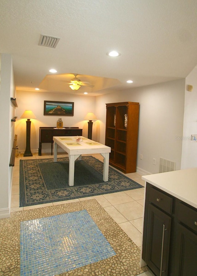 recreation room featuring light tile patterned floors, visible vents, and recessed lighting