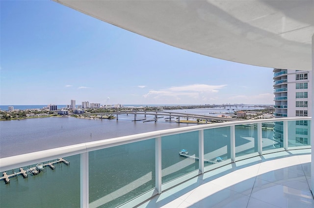 balcony featuring a water view