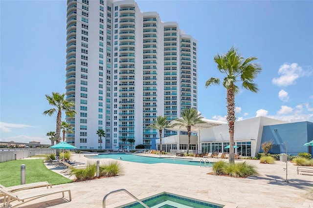 view of pool featuring a patio