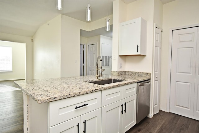 kitchen with dishwasher, light stone countertops, white cabinetry, and sink