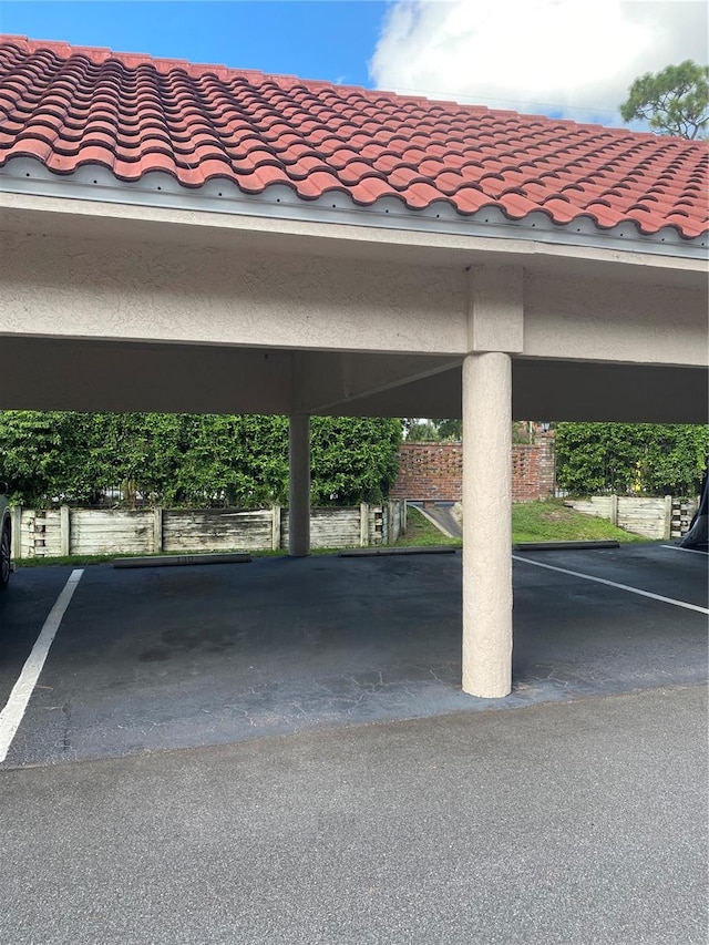 view of car parking featuring a carport