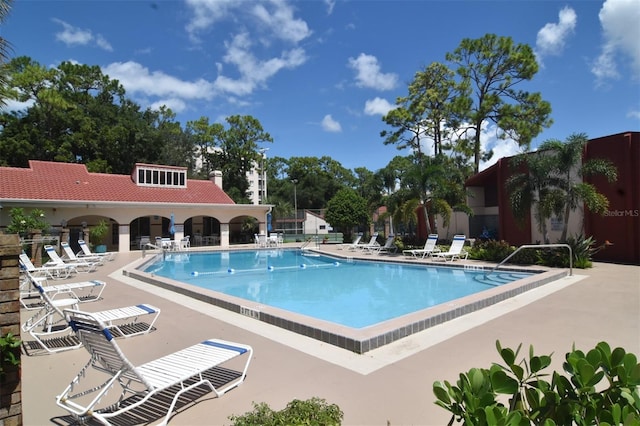 view of pool featuring a patio area