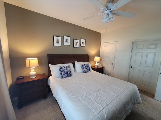 bedroom featuring ceiling fan and carpet flooring