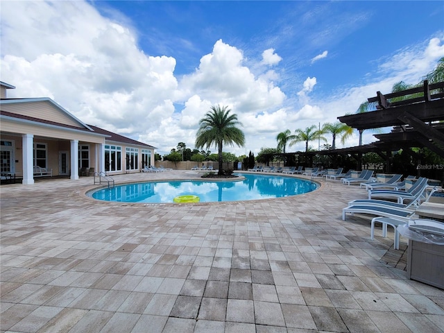 community pool with a patio