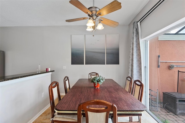 dining area with ceiling fan