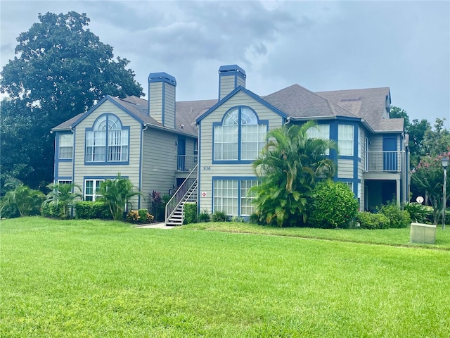 view of front of home with a front yard