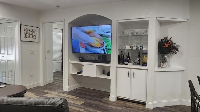 living room with dark hardwood / wood-style flooring