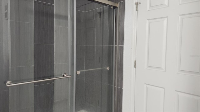 bathroom featuring walk in shower