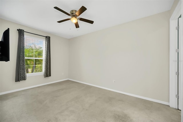 unfurnished room featuring carpet flooring and ceiling fan