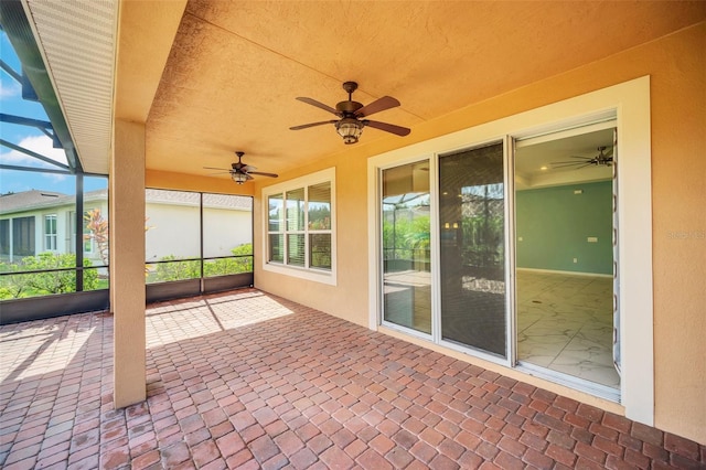 view of patio with ceiling fan