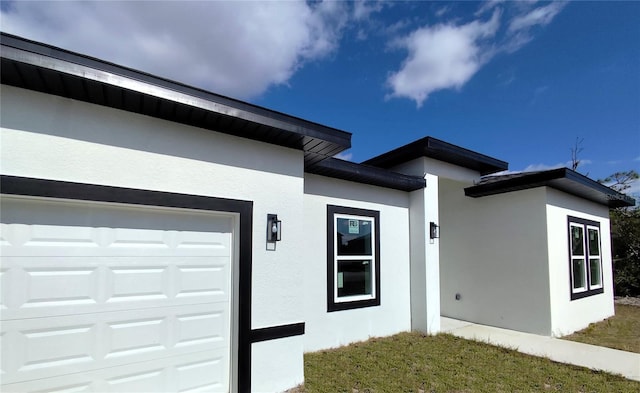 view of property exterior featuring a garage