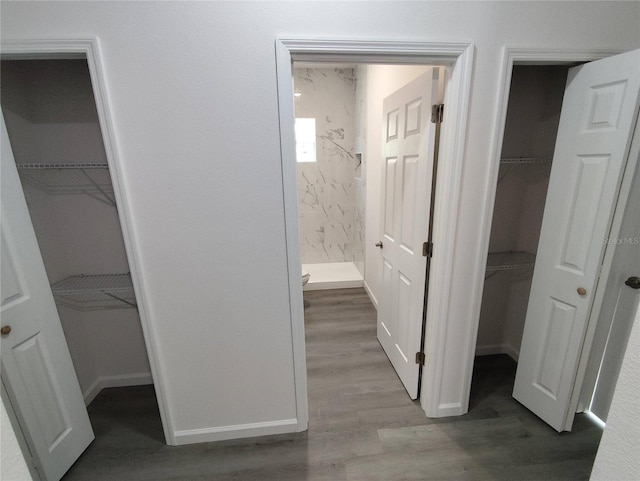 hallway featuring light hardwood / wood-style flooring