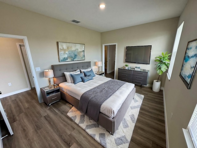 bedroom featuring dark hardwood / wood-style floors