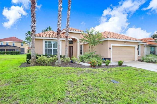 mediterranean / spanish-style house with a garage and a front yard