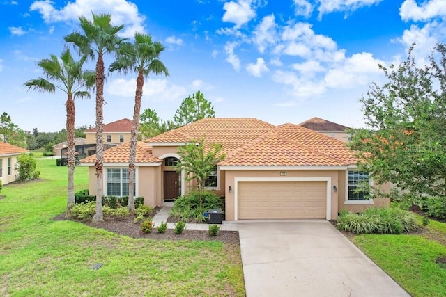 mediterranean / spanish-style home with a garage and a front lawn