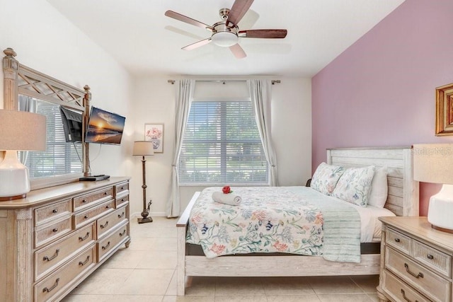 bedroom with light tile patterned floors and ceiling fan