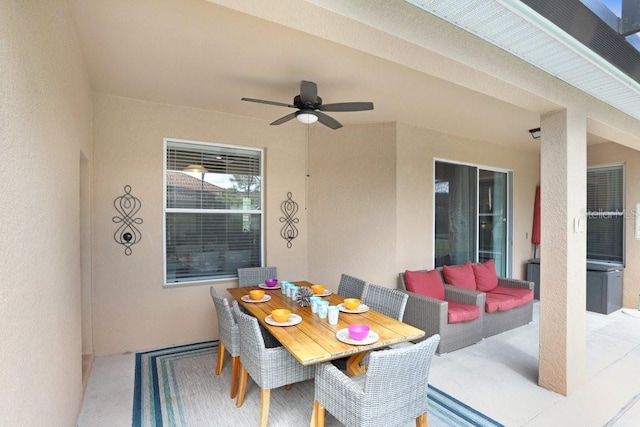 view of patio featuring ceiling fan