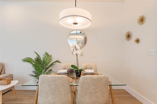 dining room with light wood-type flooring