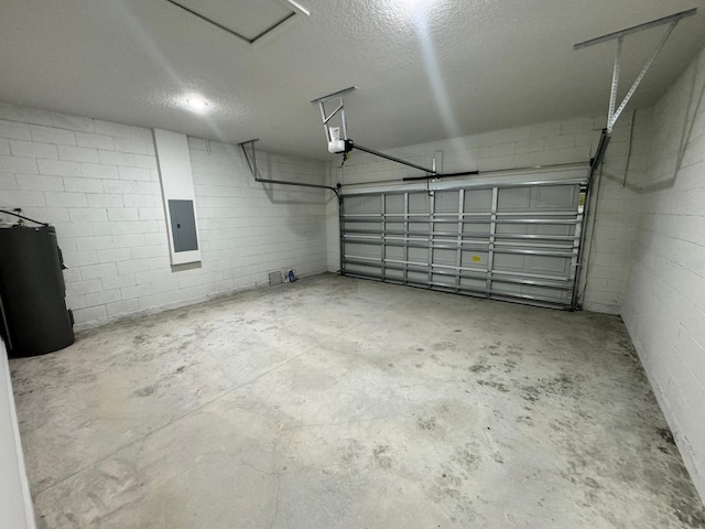 garage with water heater, concrete block wall, a garage door opener, and electric panel