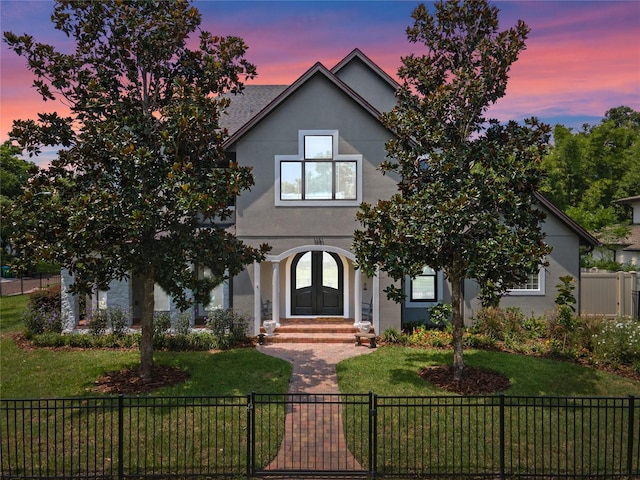 view of front of home featuring a yard