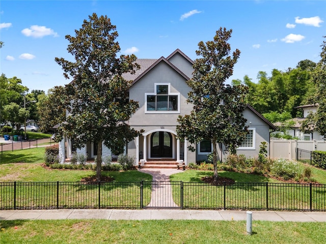 view of front of home with a front lawn