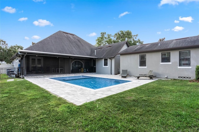 view of pool with a yard and a patio area