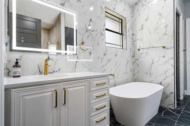 bathroom featuring a tub, tile walls, and vanity