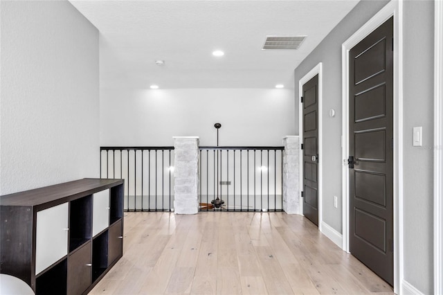 hall featuring light hardwood / wood-style flooring