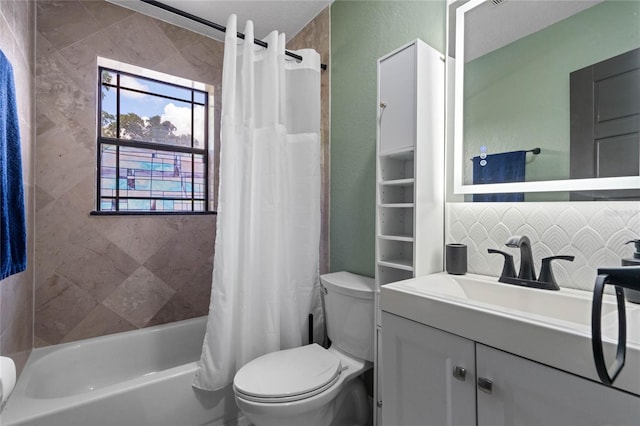 full bathroom featuring vanity, toilet, decorative backsplash, and shower / bath combination with curtain