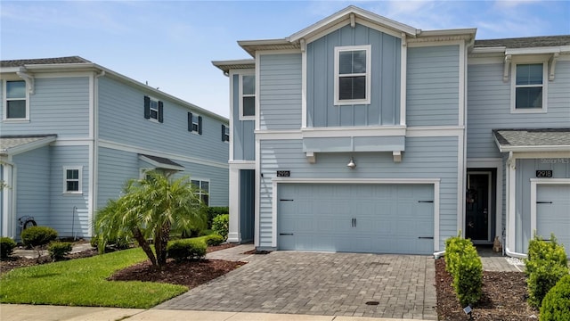 front of property with a garage