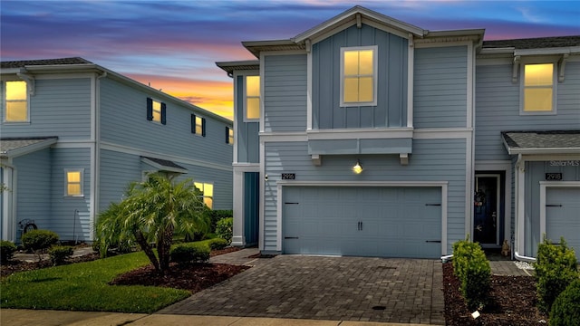 front facade with a garage