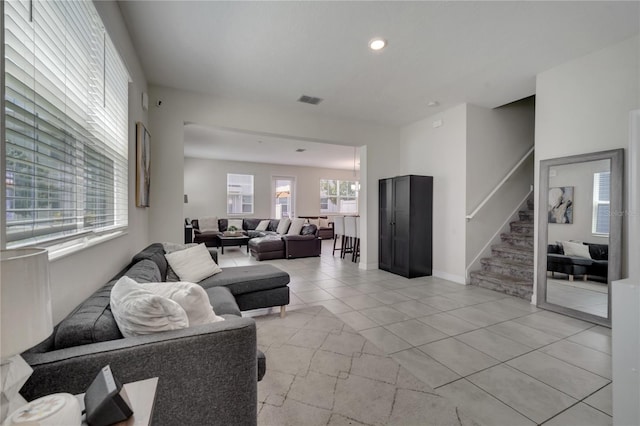 living room with light tile patterned floors