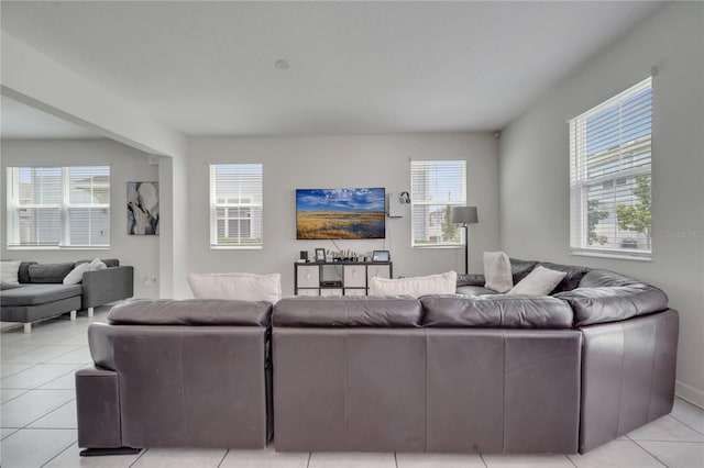 living room featuring light tile patterned flooring