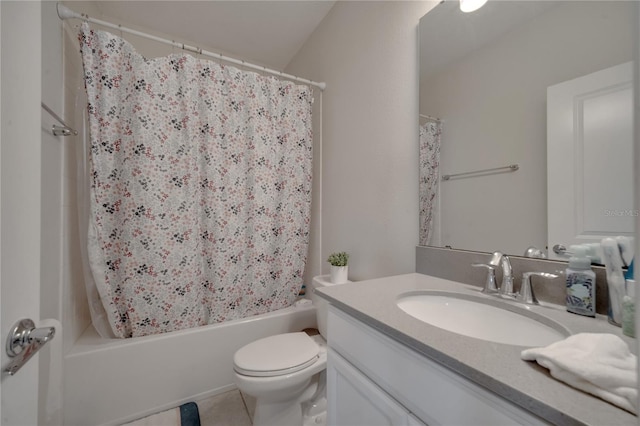 full bathroom with vanity, toilet, vaulted ceiling, and shower / bath combo with shower curtain