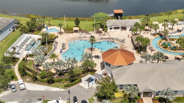 birds eye view of property featuring a water view