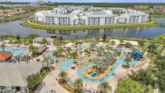 birds eye view of property with a water view