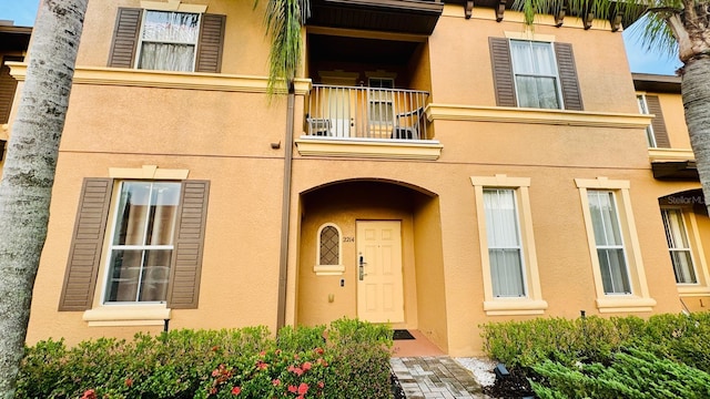 doorway to property with a balcony