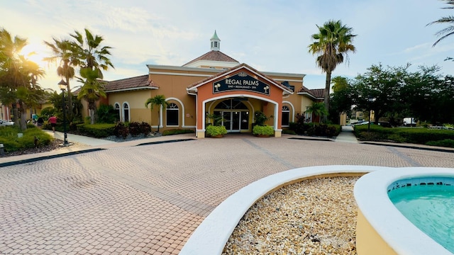 2214 Calabria Ave, Davenport, FL 33897 - view of property featuring curved driveway