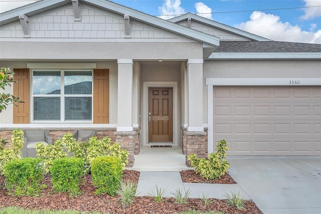 view of front of property with a garage