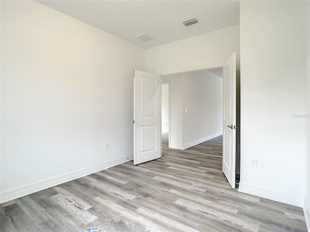 empty room featuring light hardwood / wood-style floors