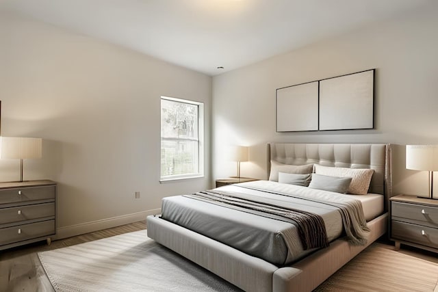 bedroom with light wood-type flooring