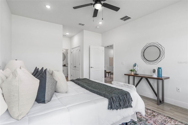 bedroom featuring ceiling fan and light wood-type flooring