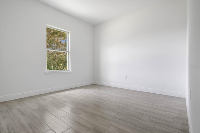 unfurnished room featuring light wood-type flooring