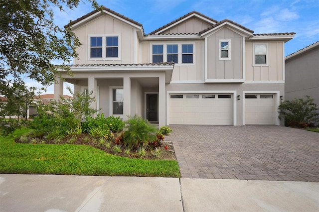 view of front of home with a garage