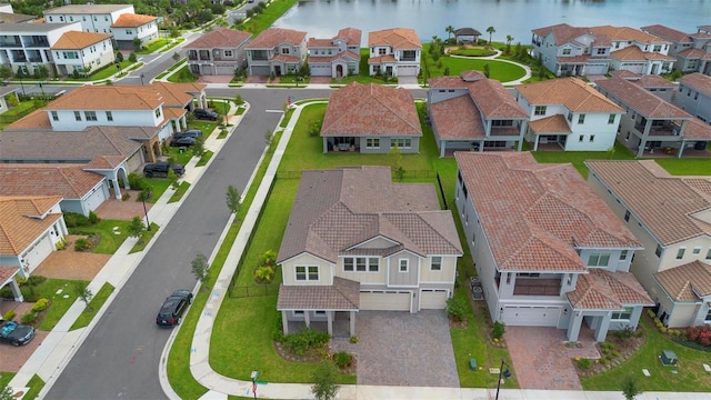 bird's eye view with a water view