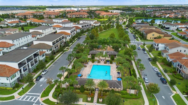 birds eye view of property featuring a water view