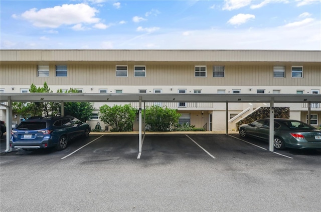 view of parking / parking lot with a carport