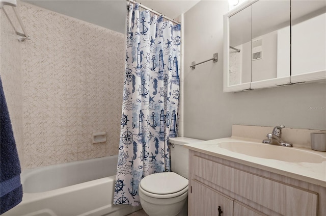 full bathroom with vanity, toilet, and shower / bath combo