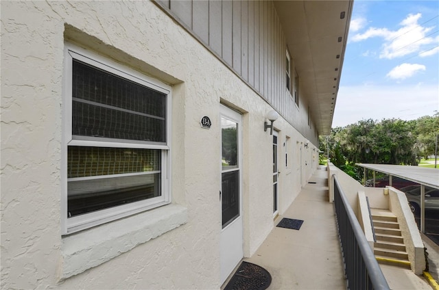 view of property exterior with a balcony